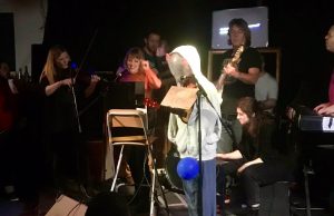 “Humans feat. ChatGPT”? – Making Music To Cross the Digital Divide at the AI Musical Spectacular